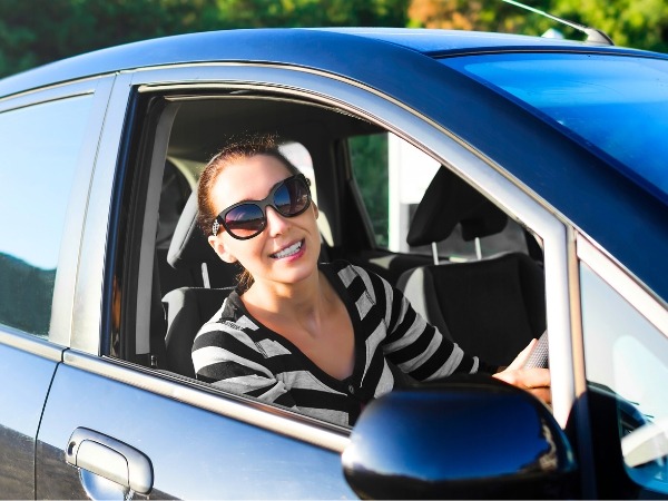 Woman Driving a Car