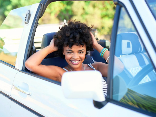 Woman with a Rental Car