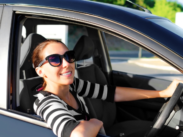 Woman Driving in Nature