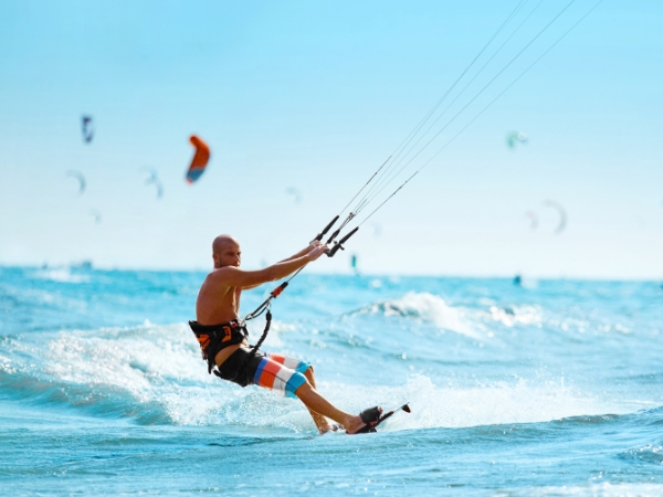Man Kitesurfing